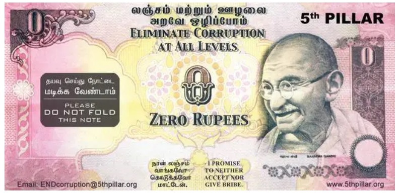 На банкноте написано «Подделка денег преследуется законом» заменен на предупреждение: «Взяточничество преследуется законом»